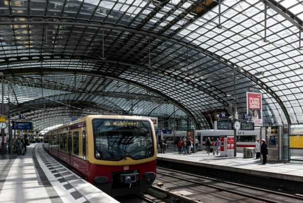 Futuristic train station in Berlin showcasing modern architecture and public transportation.