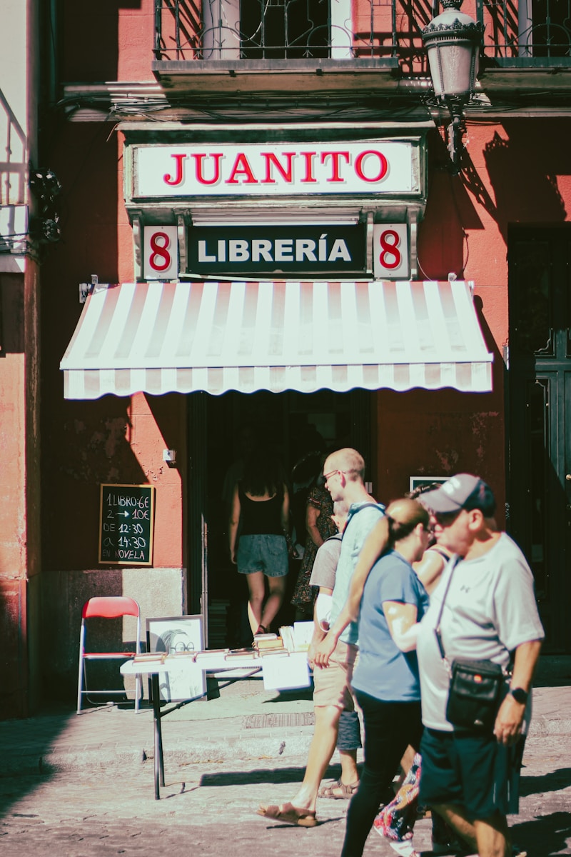 a group of people standing outside a restaurant